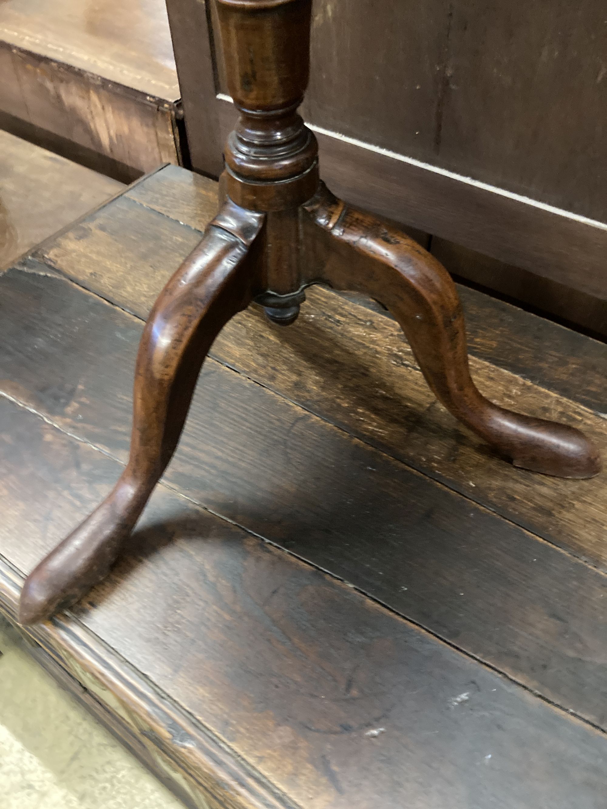 A yew wood circular tripod table, 53cm diameter, height 65cm